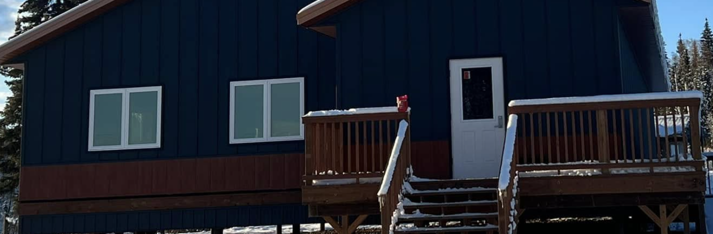 Two Rivers Lodge exterior on a snowy Alaskan morning
